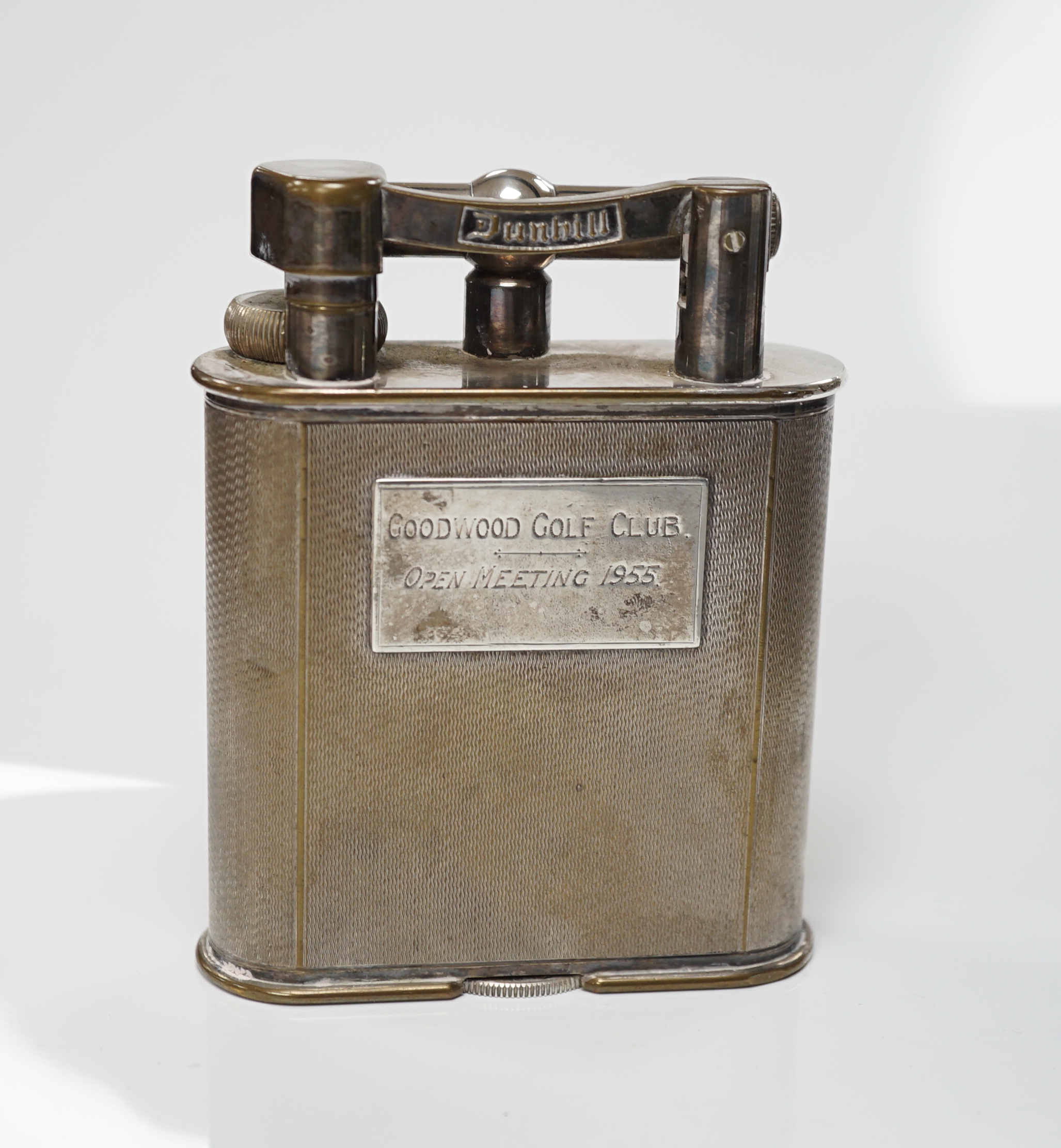 A Dunhill table lighter ‘Goodwood golf club. Open meeting 1955’